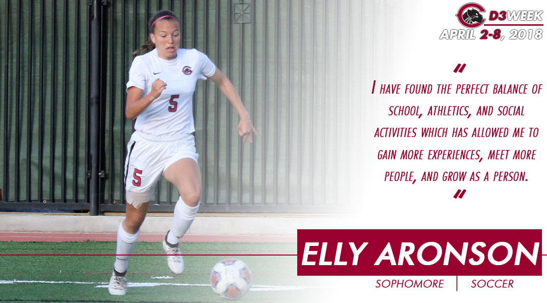 Elly Aronson dribbles a soccer ball.