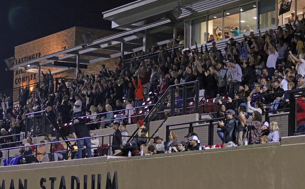 The crowd celebrates a SCIAC title