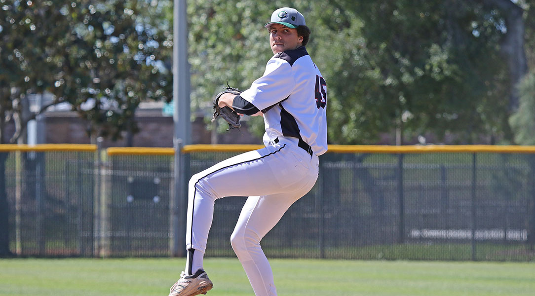 Christian Cosby winds up to deliver a pitch.