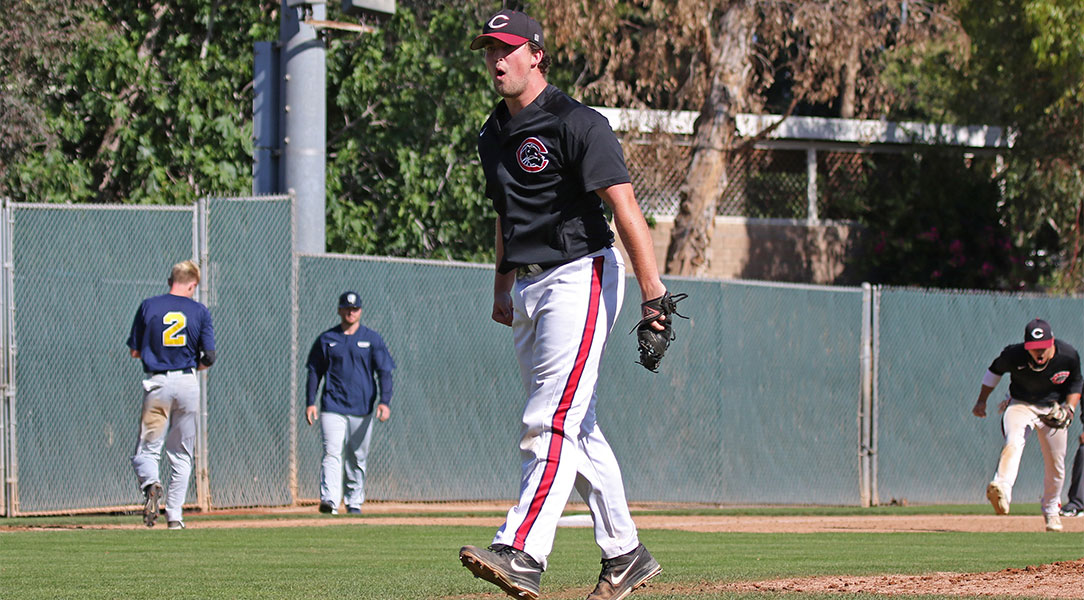Tyler Peck jumps off the mound to celebrate a strikeout.