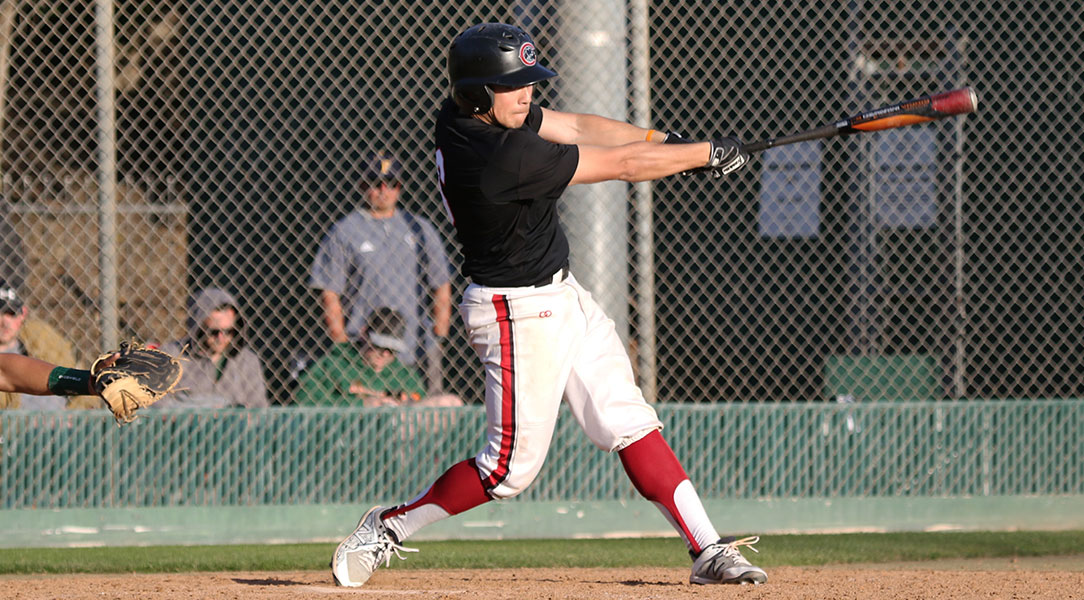 Aaron Wong hits the ball.