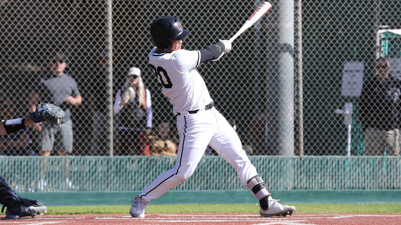 Kai Osaka swinging to hit the baseball.