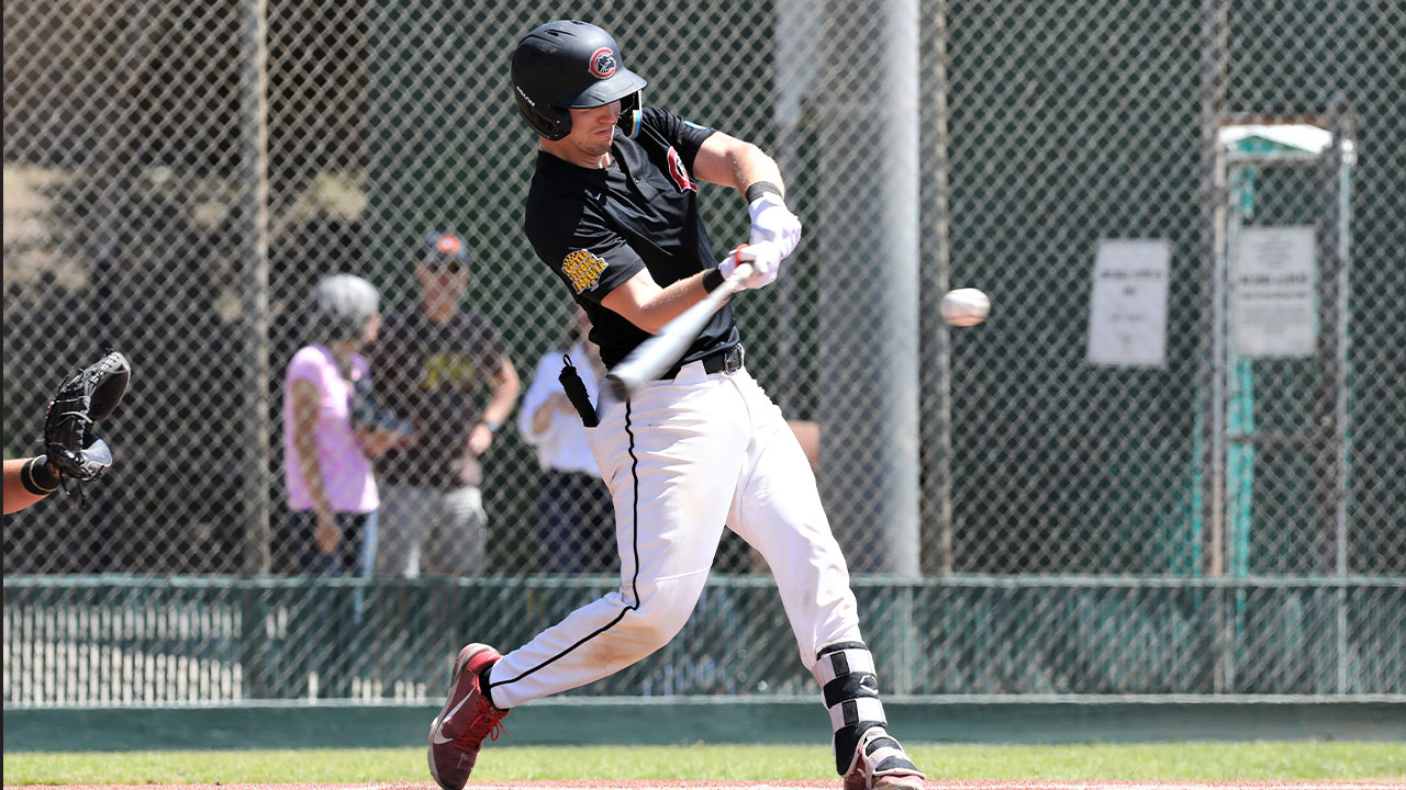 Trent Turquand hits a baseball.