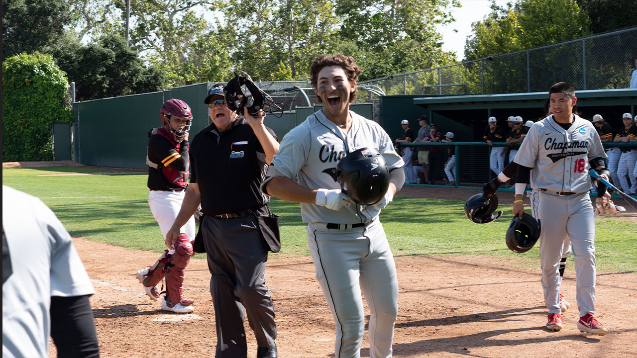 AJ Anzai celebrates after hitting a home run.