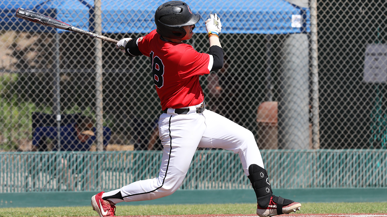 Brad Shimabuku hits the ball.