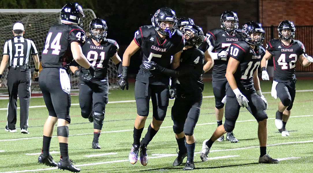 Sal Ochoa III is congratulated after an interception.