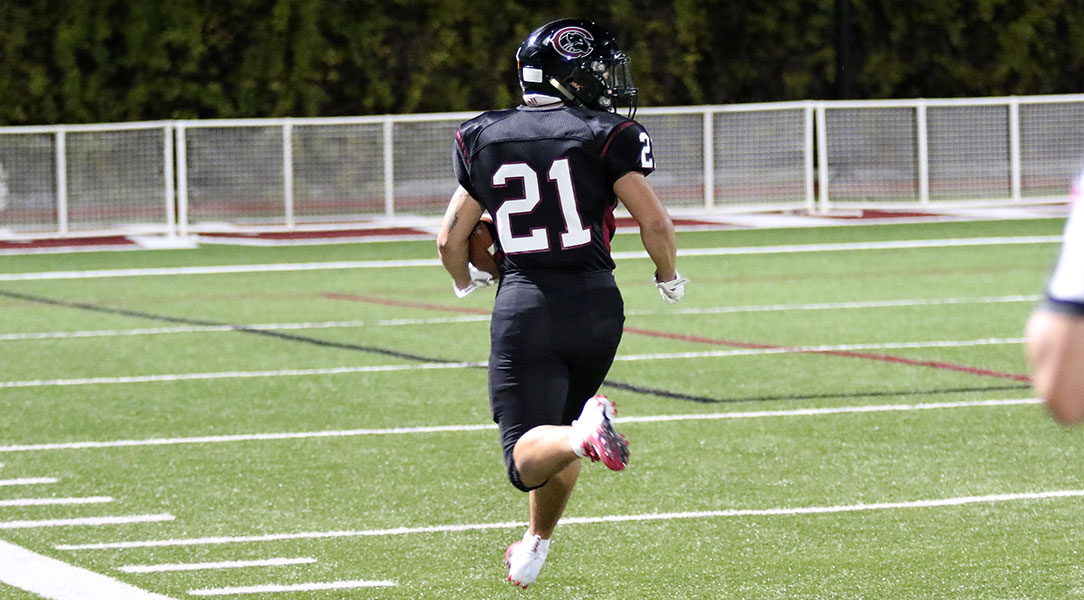 Nico Ragas returns the kickoff for a touchdown.