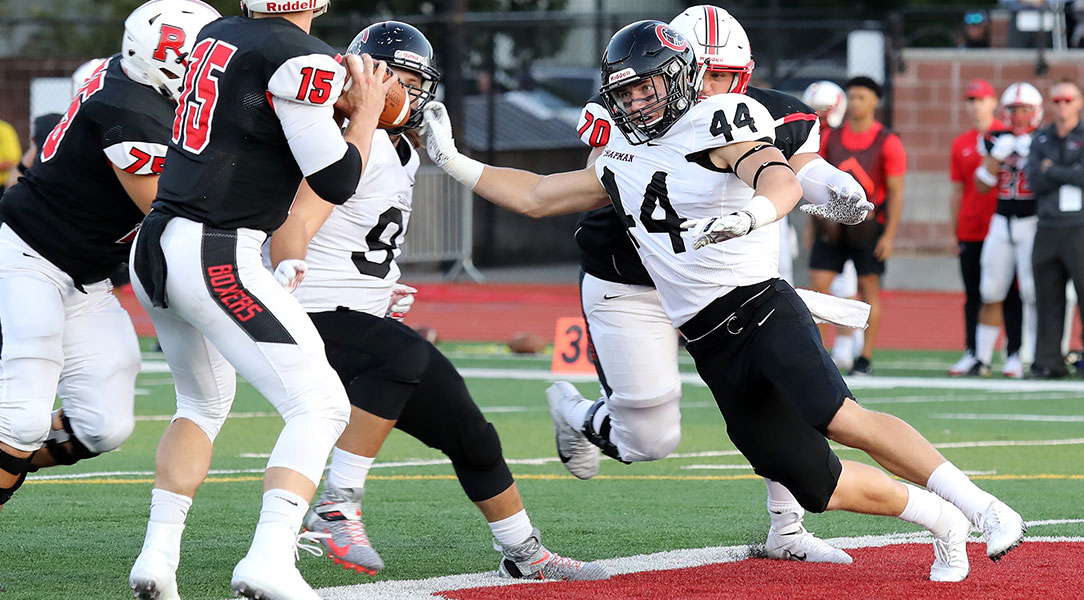 Dillon Keefe evades a blocker on the way to the quarterback.