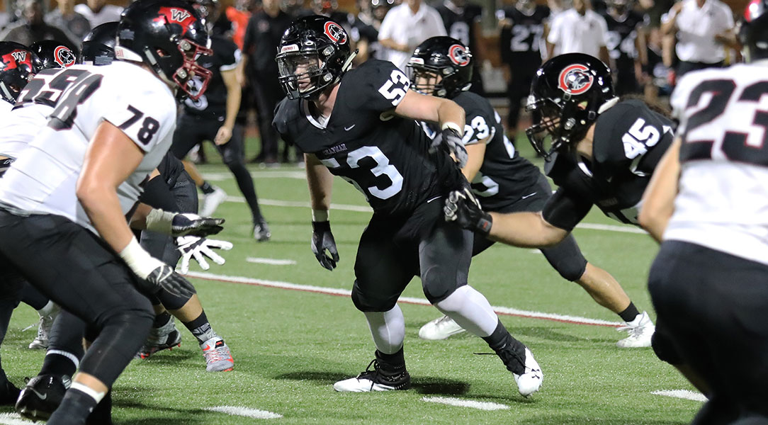 Noah Kjos gets ready for a tackle.