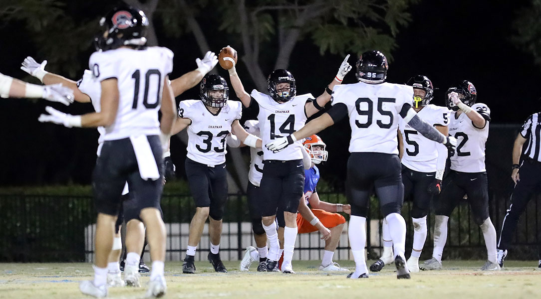 Nathan Parkin and teammates celebrate an interception.