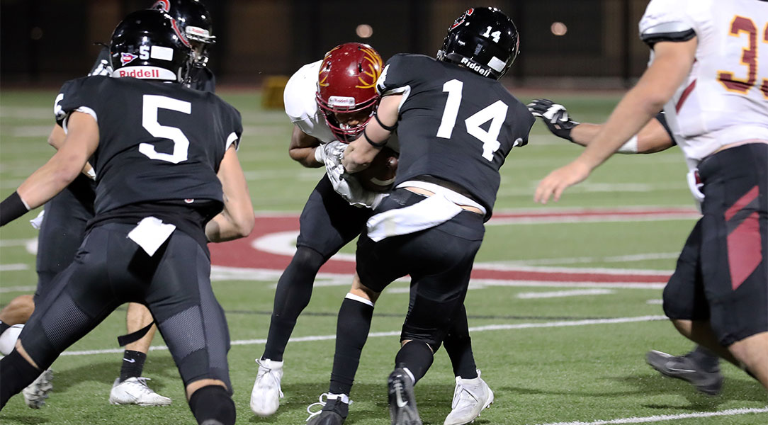 Nathan Parkin strips the ball from a running back.