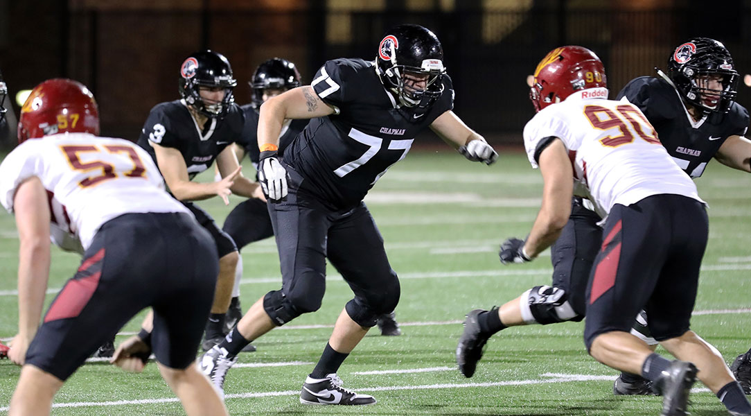 Hunter Spriggs blocks a defender.