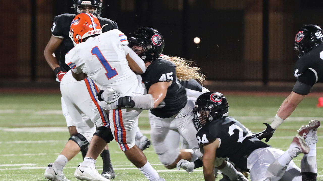 Alex Terriquez goes in for a tackle.