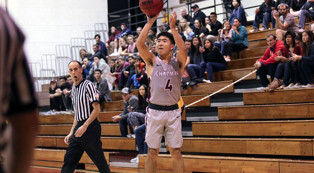 Reed Nakakihara shoots a three-pointer.
