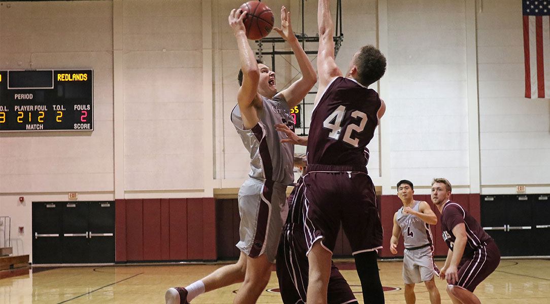 Reed Smith shoots over a defender.