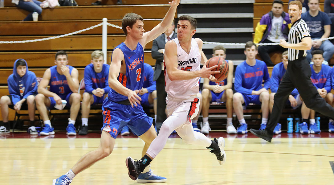 Cam Haslam drives past a defender.