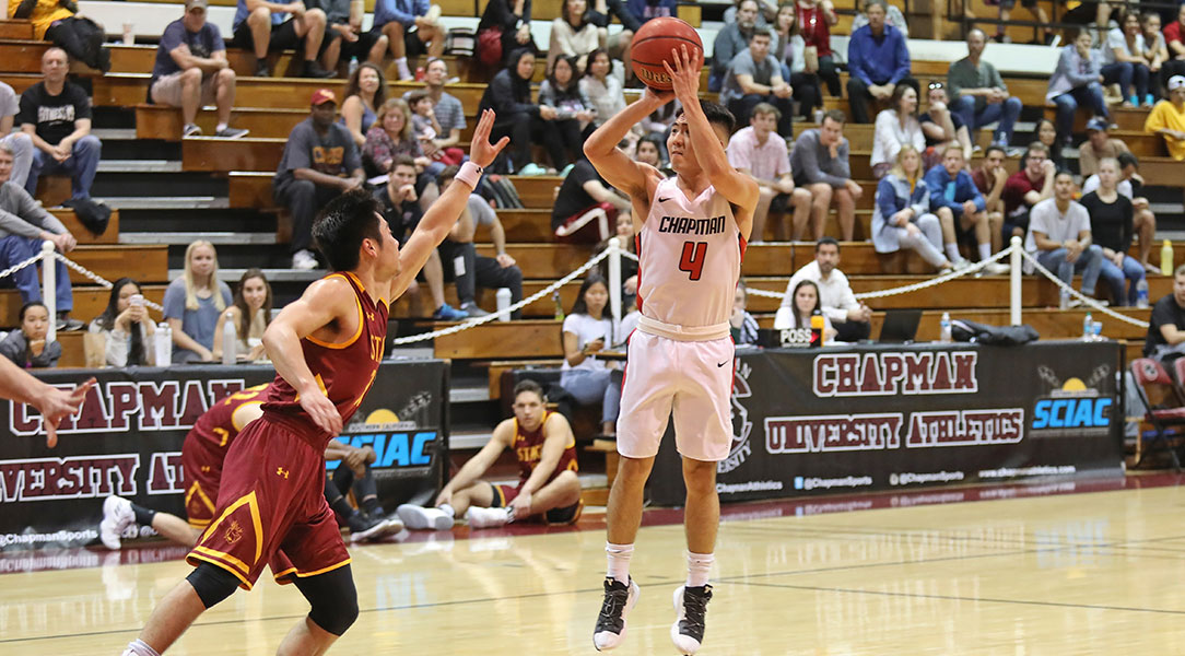 Reed Nakakihara shoots a three-pointer.