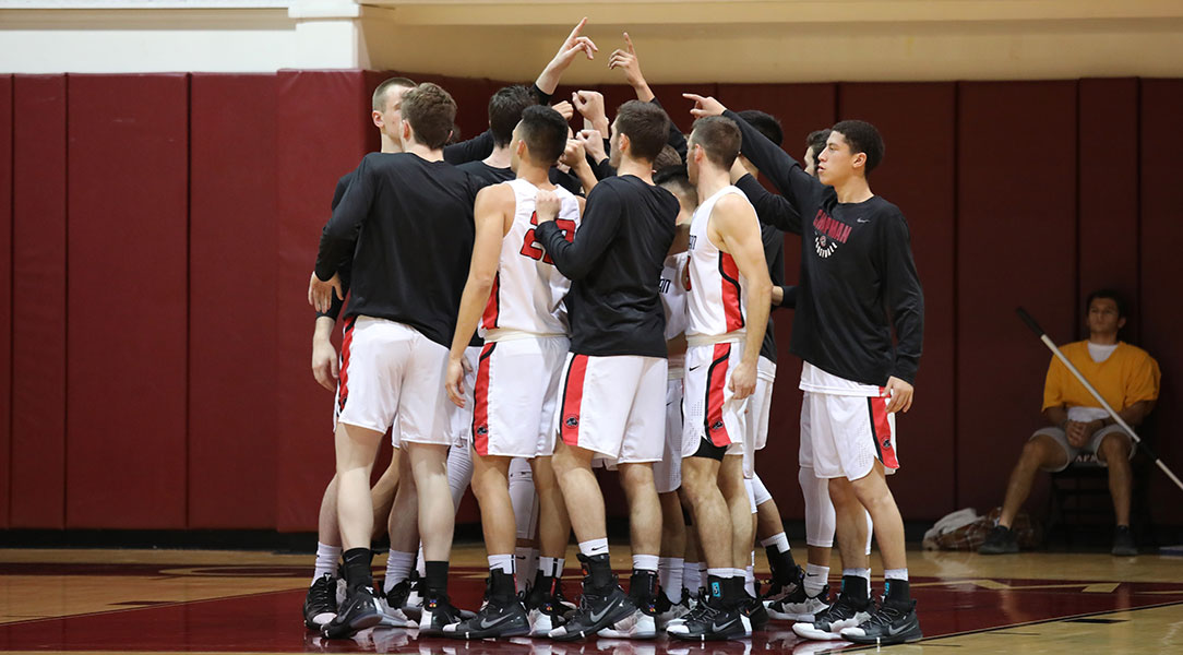 The team huddles before a game.