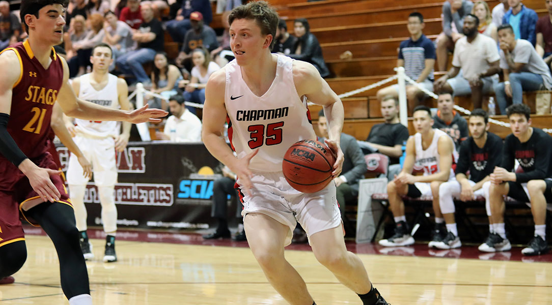 Chandler White drives to the basket.
