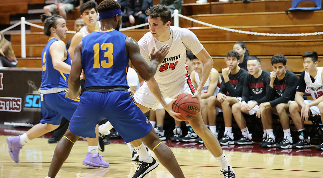 Daniel Foldes drives to the basket.