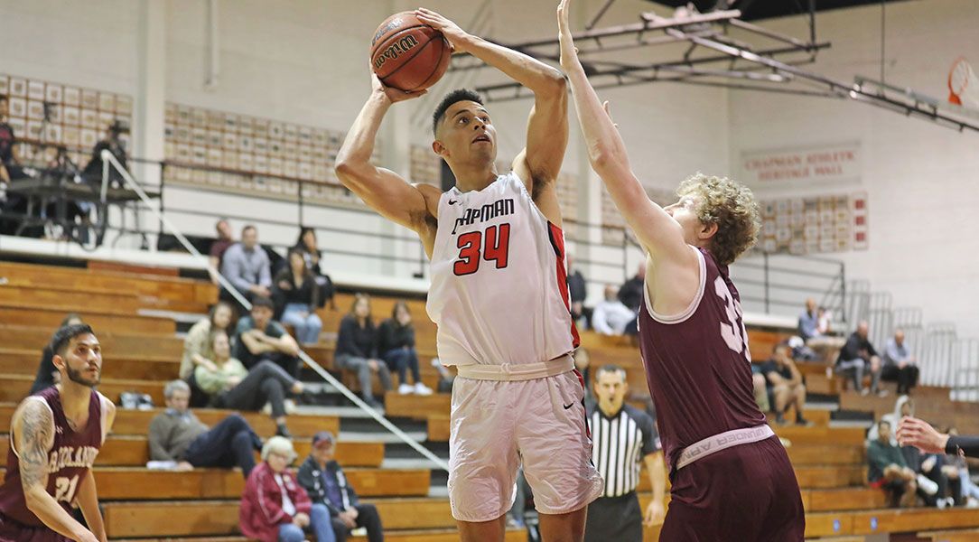 Alex Rogat shoots over a defender.