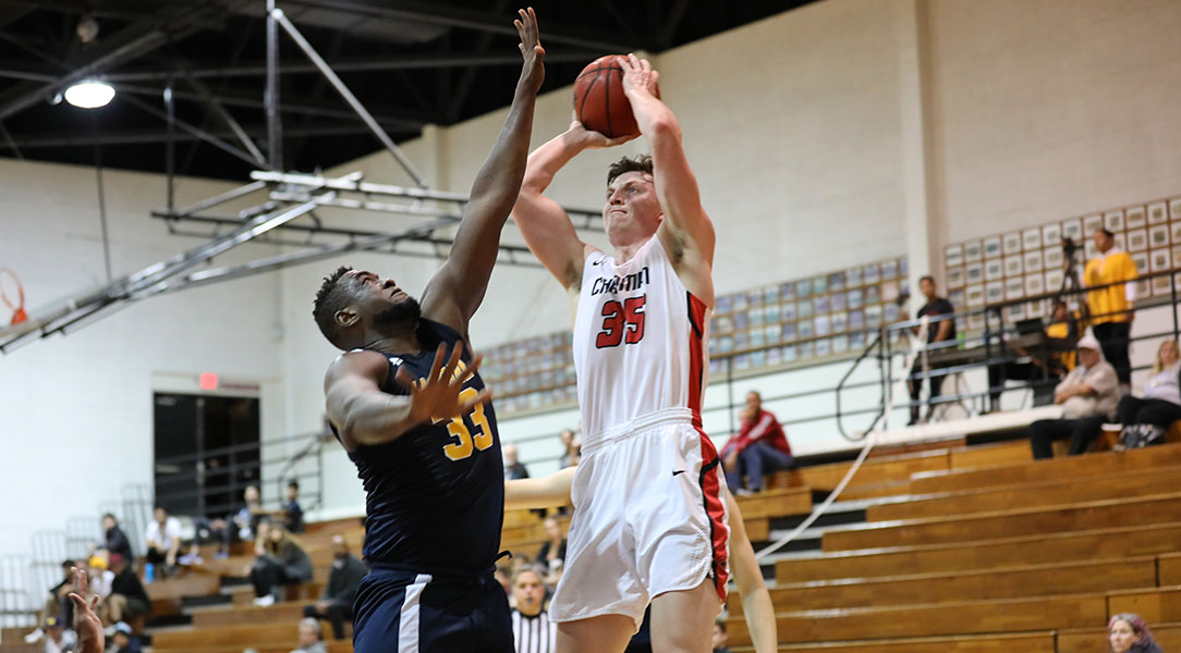 Chandler White shoots over a defender.