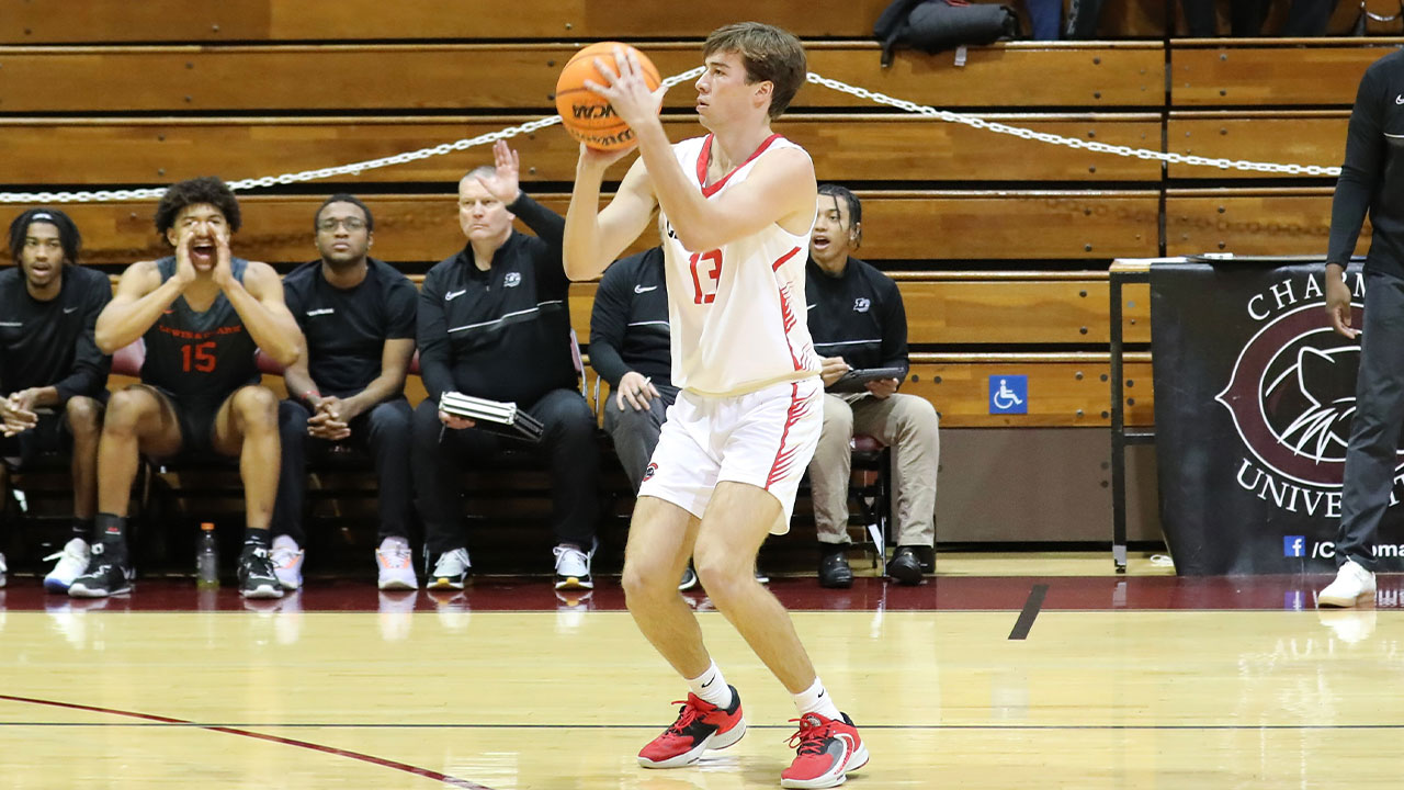 Jake Heberle shoots a three-point shot.