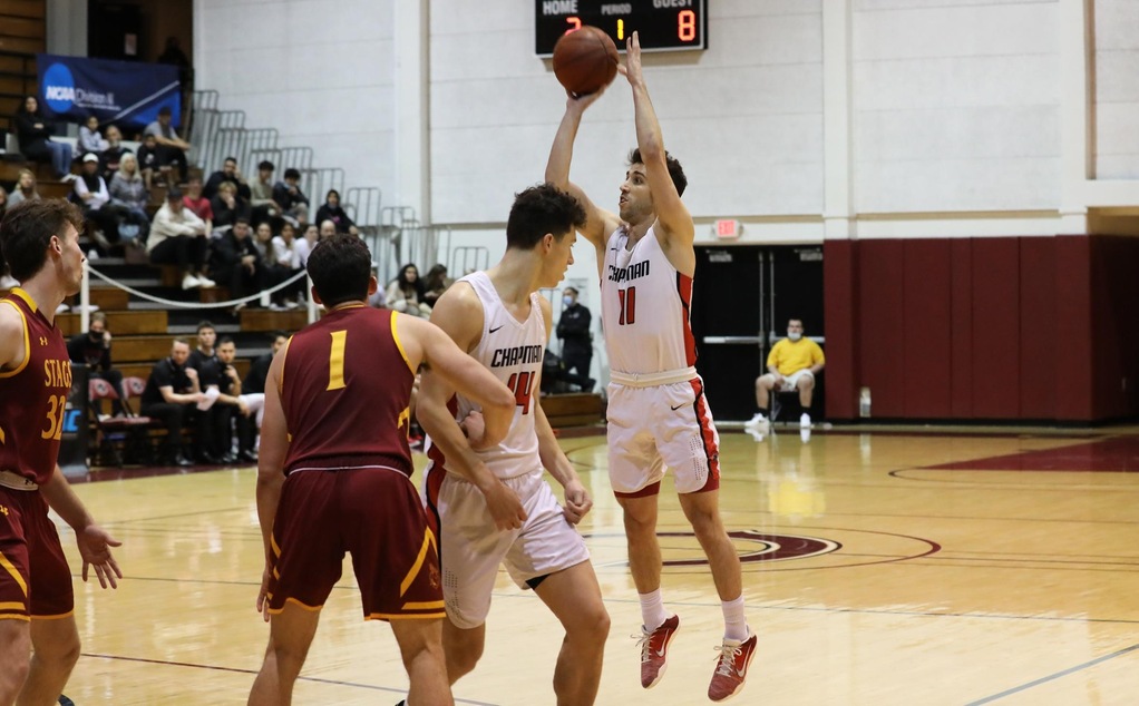 Jack Roggin shoots a three-pointer.