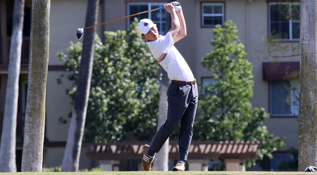 Griffin Tso tees off.