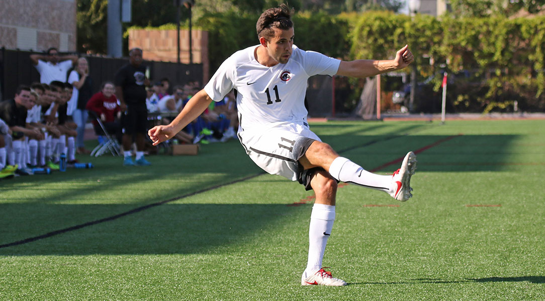 Javier Bernaldo passes the ball.