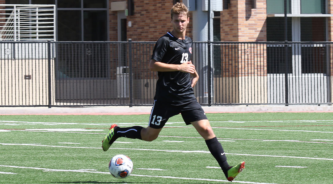 Jarod Matteoni dribbles up the field.