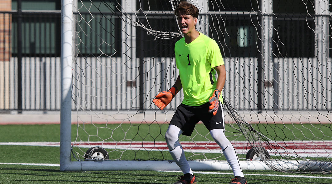 Chandler Siemonsma yells out instructions.