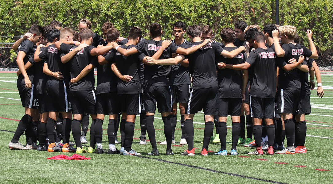 The team huddles before the game.