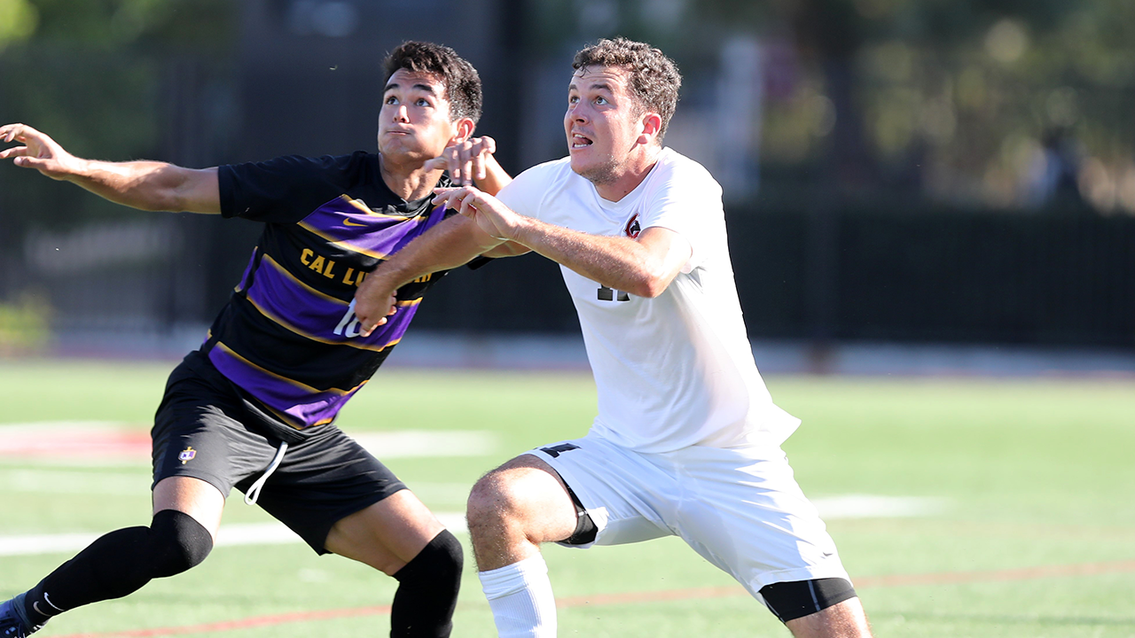 Aidan Wall fights for the ball.