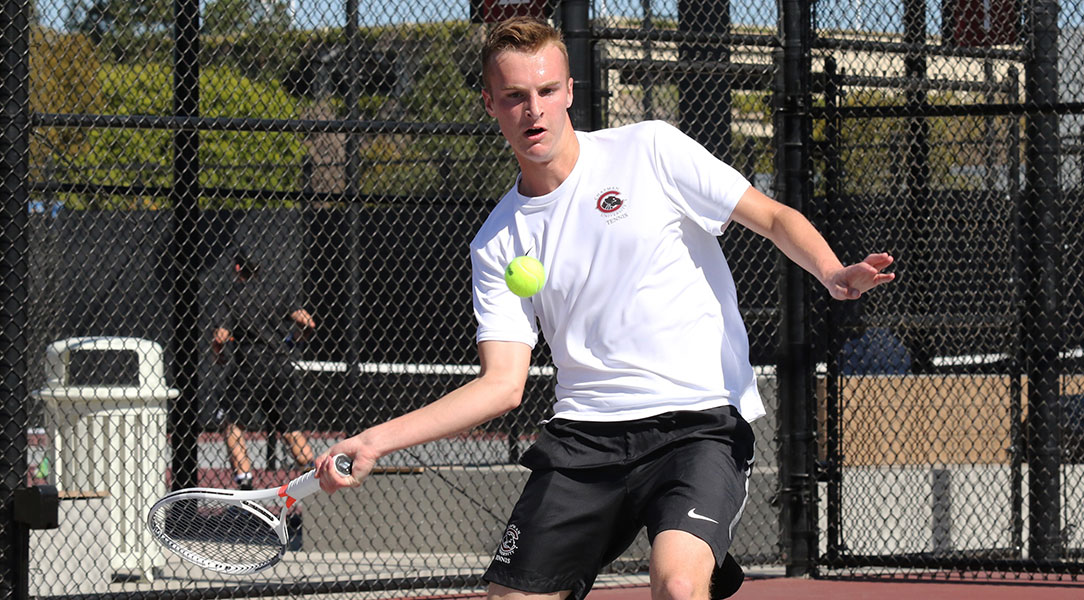 Troy Manditch hits the ball.