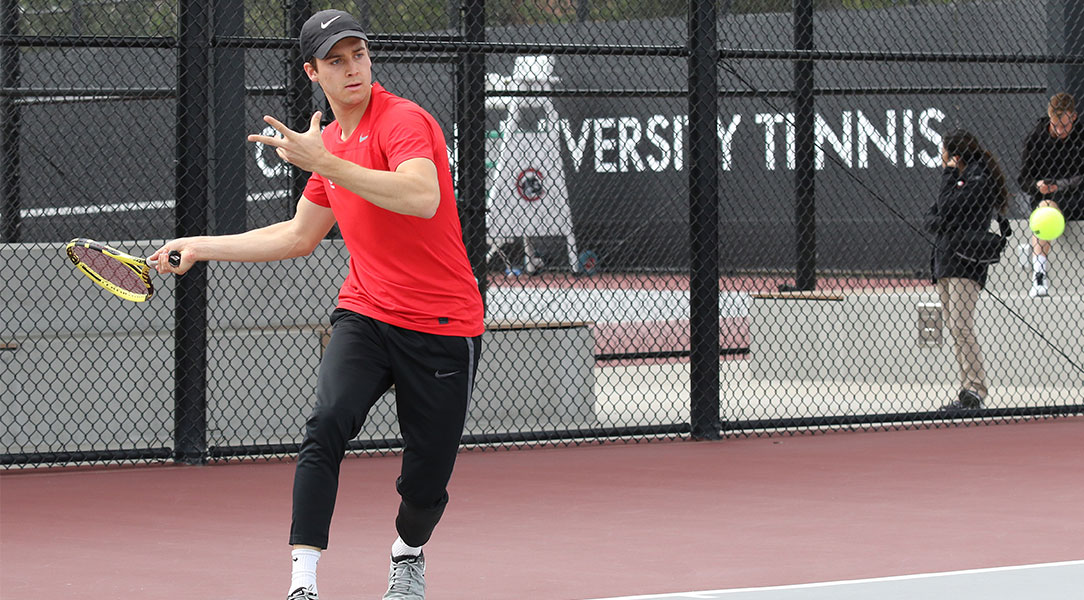 Brock DeHaven runs into a forehand swing.