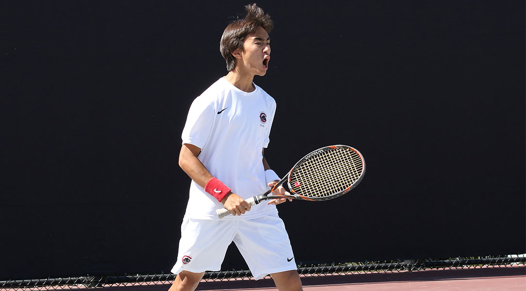 Len Kamemoto celebrates a point.