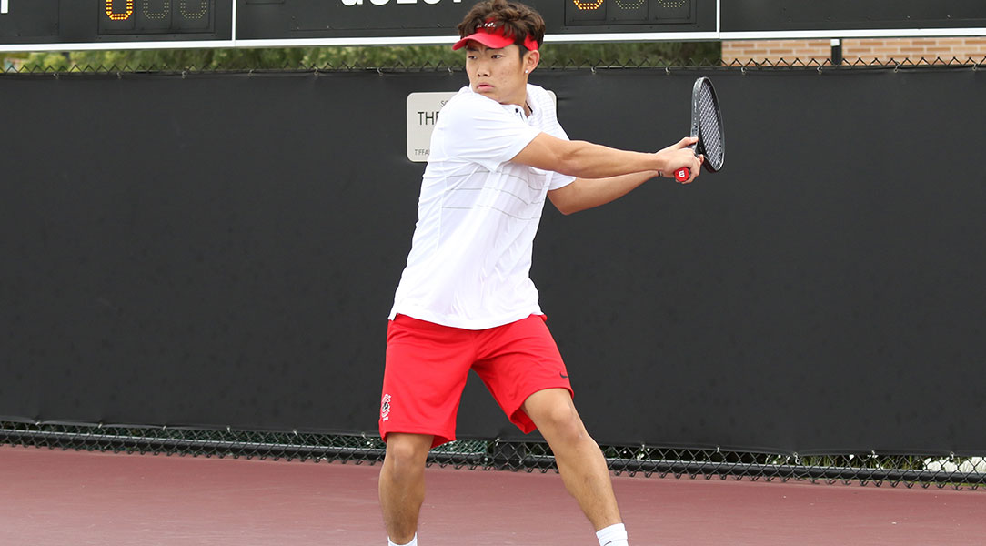 Jacob Lee swings backward in anticipation of the ball.