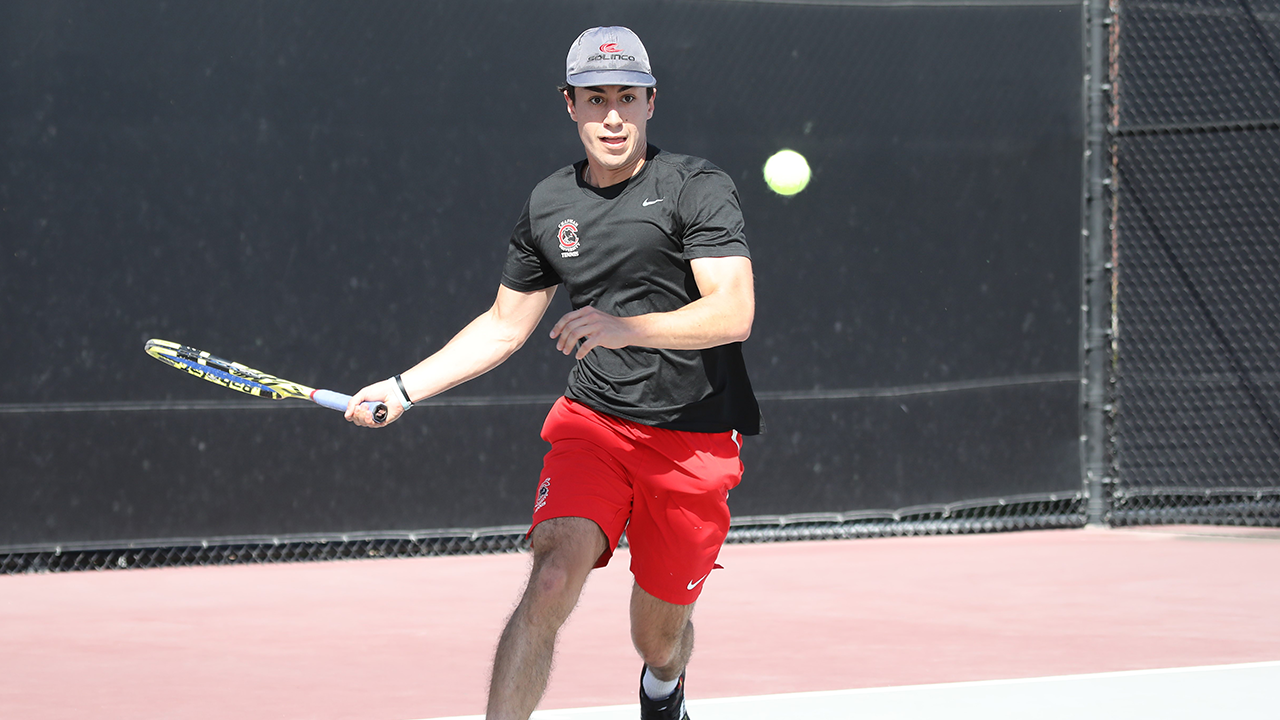 Tommy Hays hits a forehand.