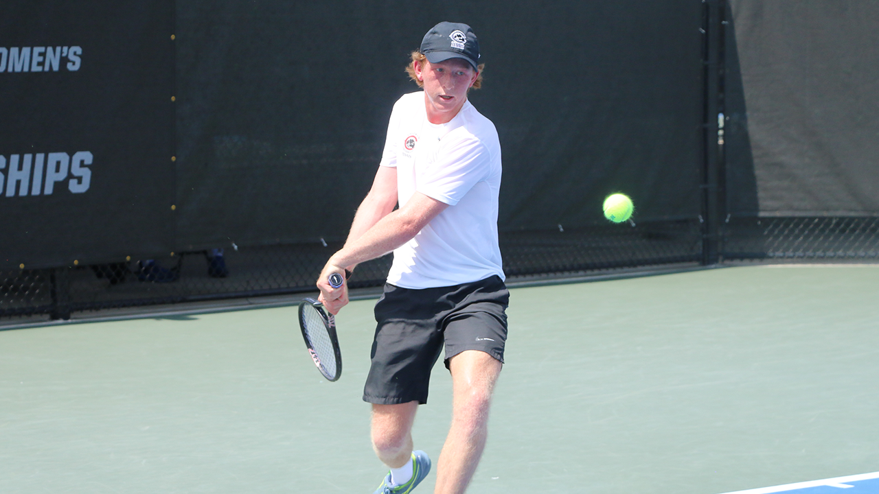 Caleb Wilkins hits a backhand.