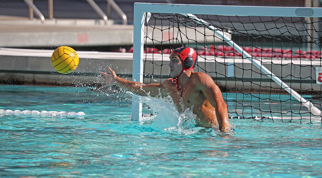 Wes Hertel saves a shot.