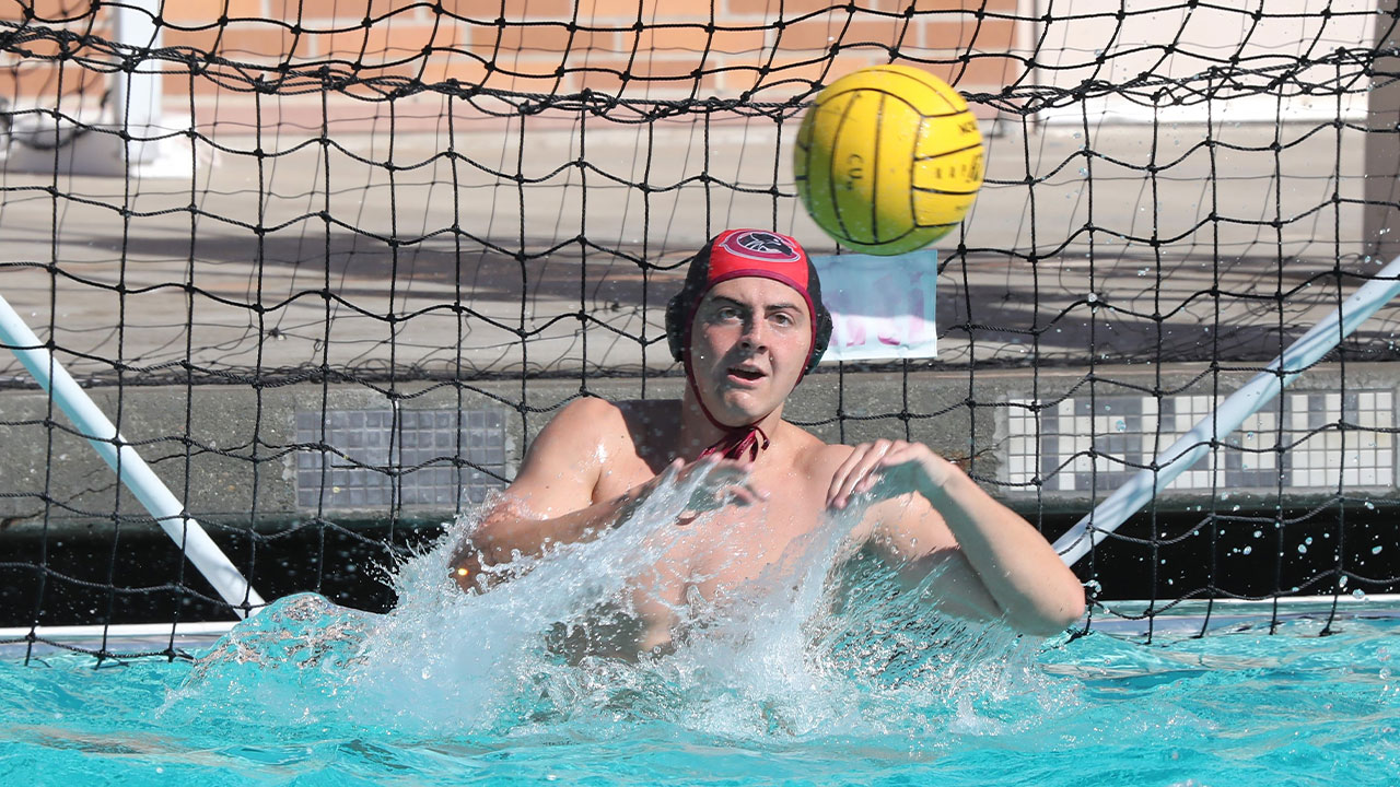 Tanner McMillen reaches to make a save in the pool.