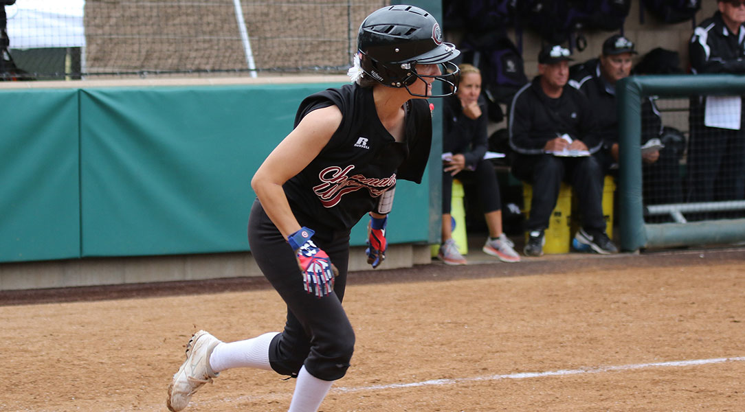 Michaela Foisy runs to first base.