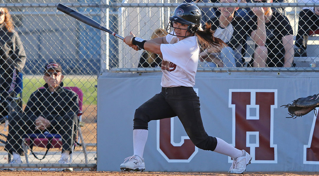 Sarah Sumida takes a swing.