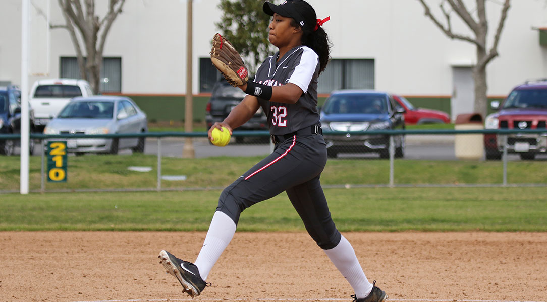 Ayanna Sanchez winds up for a pitch.