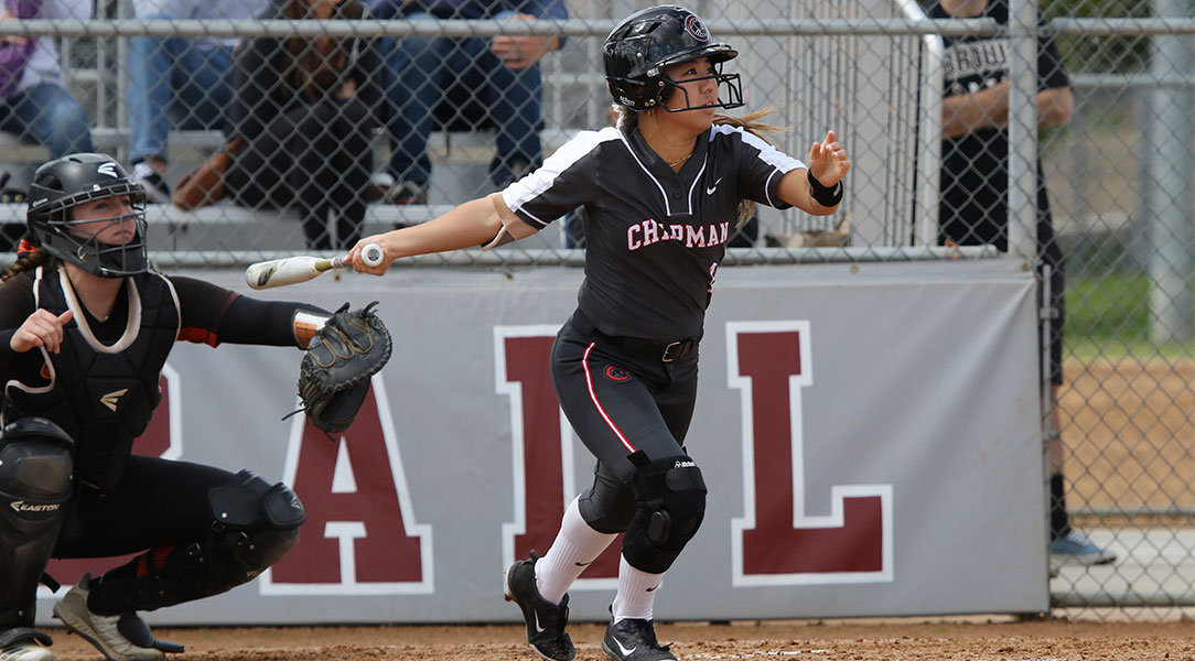 Sarah Sumida follows through after hitting the ball.
