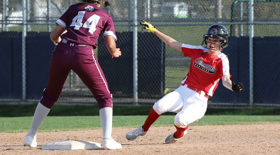 Michaela Foisy slides into second base.