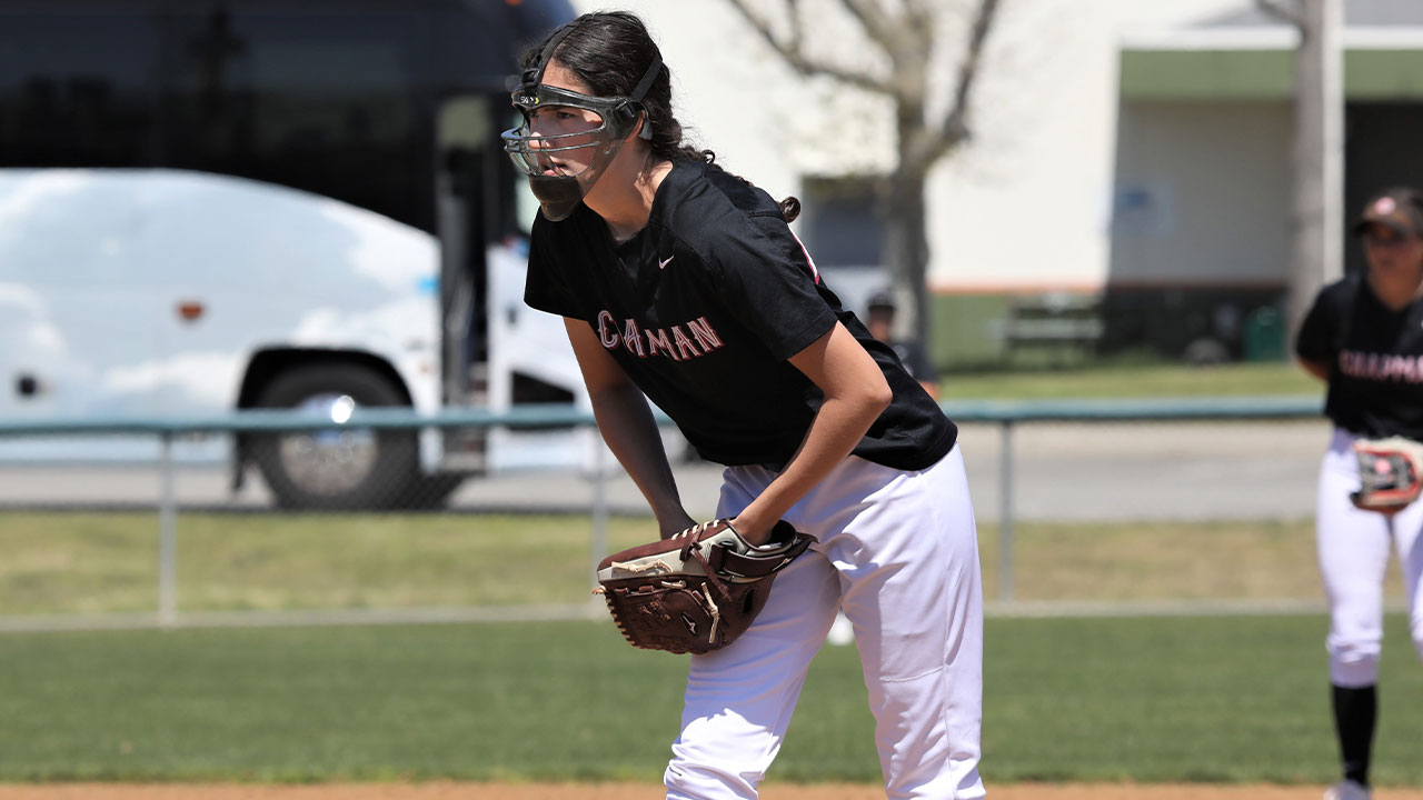 Simi Lauwers looks to the plate from the pitcher's circle before pitching.