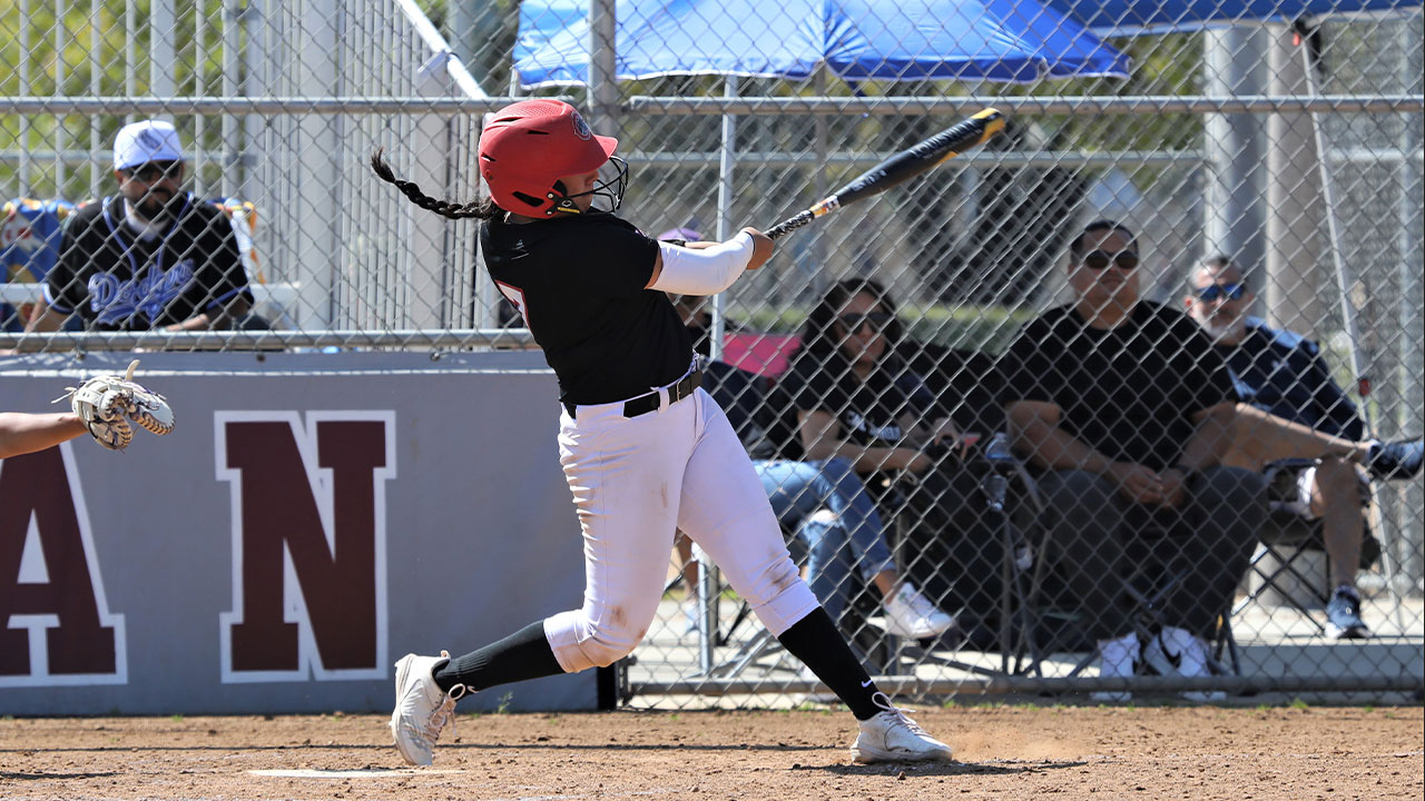 Ilianna Serna swings and hits a single. 
