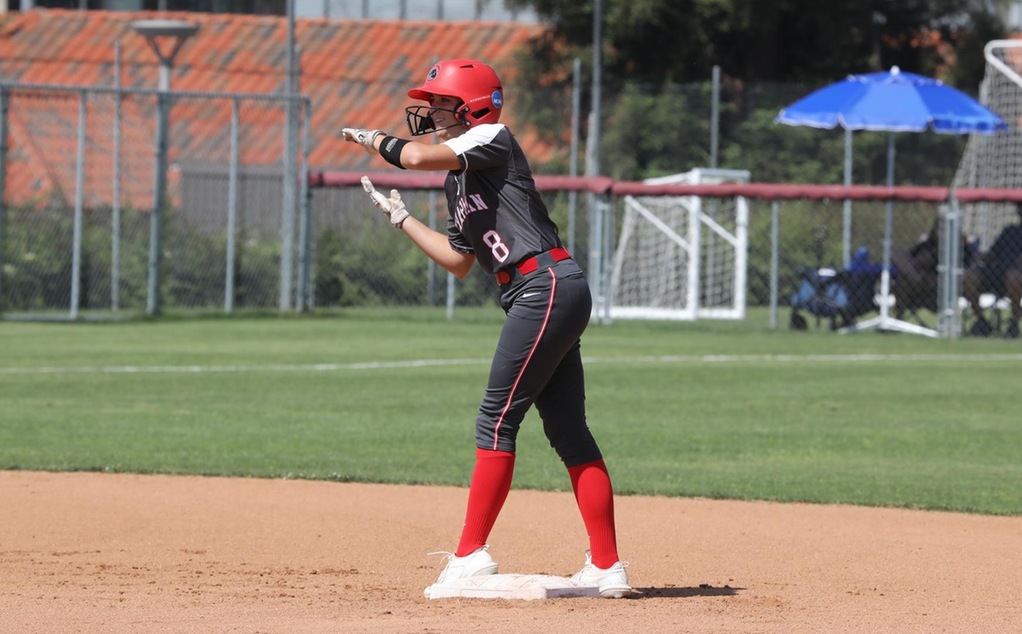 Grace Fosselman celebrates after an RBI-double.
